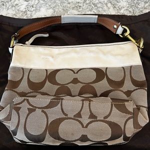 Women’s Coach signature shoulder bag